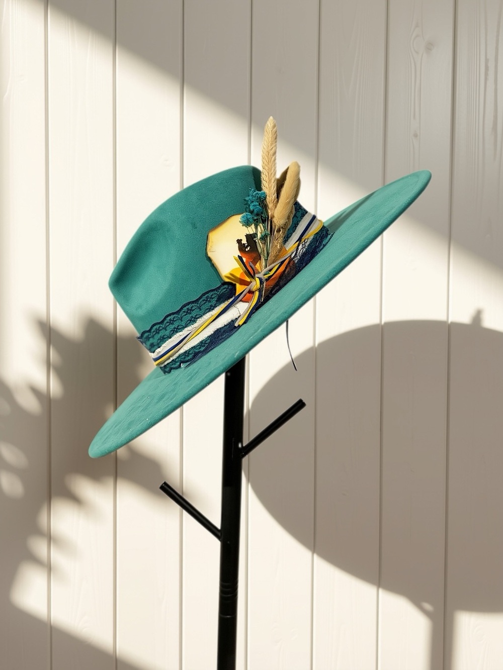 Teal Wide-Brim Fedora Hat with Decorative Band and Feathers